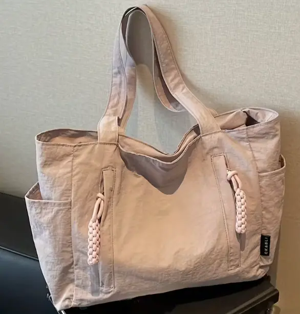 Bolsa de mano para mujer de nylon duradero rosa