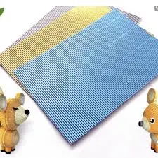 [7501987559299] Pliego de papel corrugado pascua metálico azul cielo 77X54